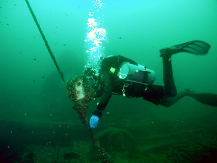 Diver repairing mooring Diver repairing mooring