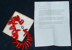 Coral Necklace and Letter